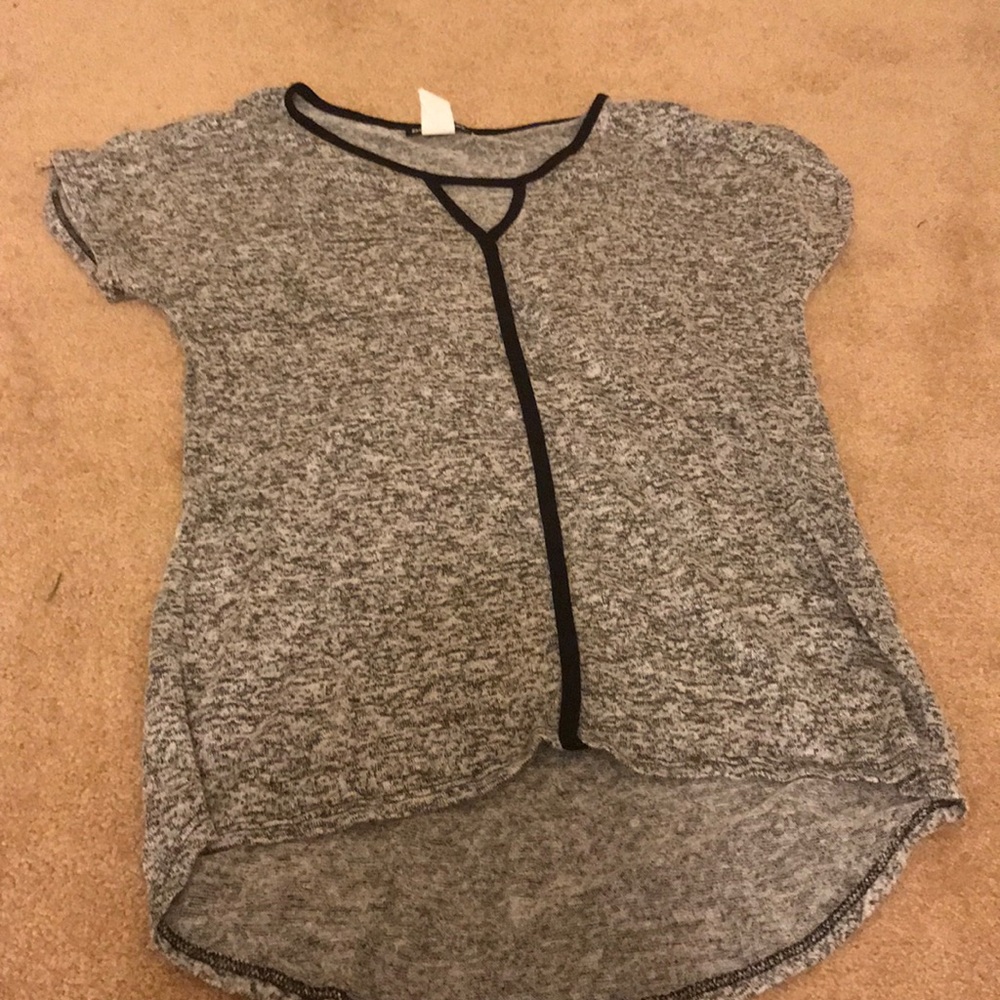 Grey shirt with black outline and design